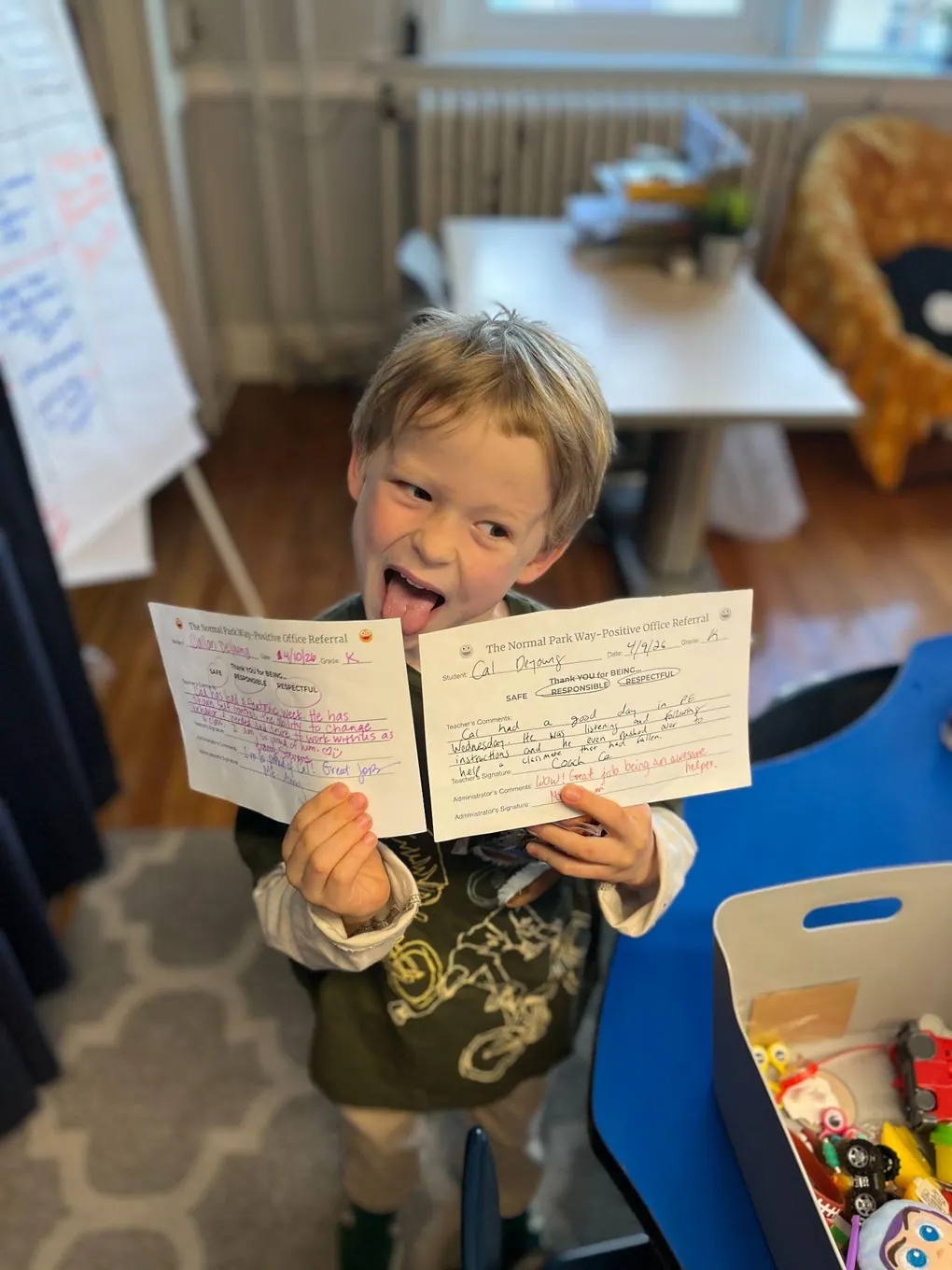 A student holding an open note